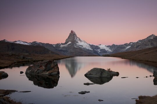 Mt Matterhorn before sunrise, reflection in Stellisee Lake with visible umbra, Zermatt, Canton Valais, Switzerland, Europe, PublicGround, Europe