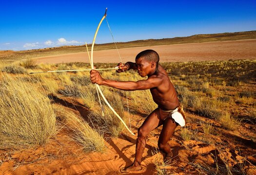 Bushman of the San people hunting, !Xaus Lodge, Kalahari or Kglagadi Transfrontier Park, Northern Cape, South Africa, Africa