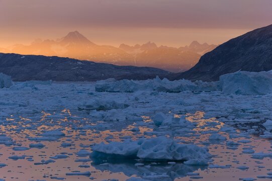 Midnight sun, ice and icebergs, Johan Petersen Fjord, East Greenland, Greenland, North America
