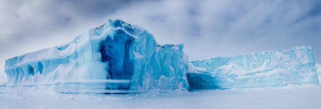 Panoramic view of icebergs seen from frozen fjord, Baffin Island, Davis Straight coast, Nunavut, Canada, North America