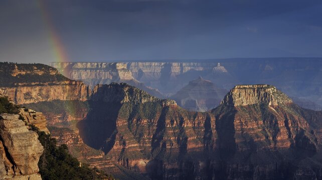 Thunderstorm, rainbow, view from Bright Angel Point with the last light of the day on Wotan's Throne, Walhalla Plateau, Deva Temple, Brahma Temple, evening mood, Grand Canyon National Park, North Rim, Arizona, United States of America, USA, North America