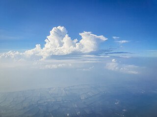 Fototapeta premium Airplane view, see clouds in the sky