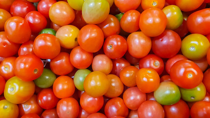 Fresh ripe red tomatoes texture background