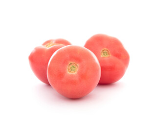 Three fresh tomatoes on white background