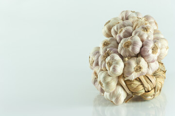 Bundle of garlic isolated on white backgrond.