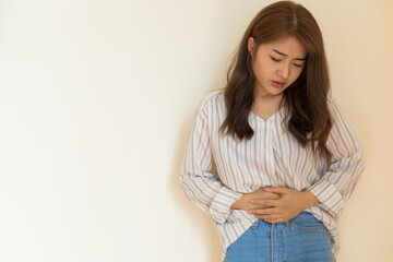 Young Asian women have severe stomachache