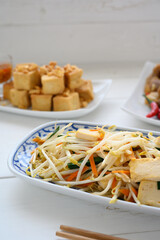 Stir Fried Bean Sprouts with tofu and scallion. Asian vegetable stir fry