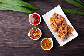 Crispy fried sliced belly pork with spicy sauce