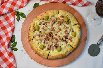 pizza with cheese and bacon with a white background