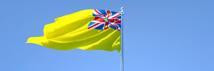 3D rendering of the national flag of Niue waving in the wind against a blue sky