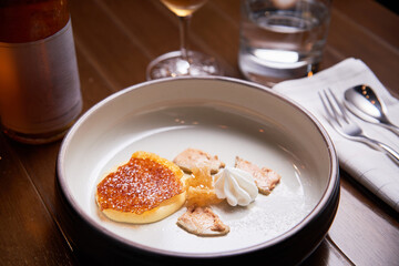 creme brulee dish in high cuisine restaurant