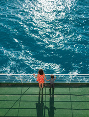 The family is sailing on a cruise ship