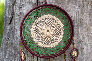 Handmade dream catcher with feathers threads and beads rope hanging