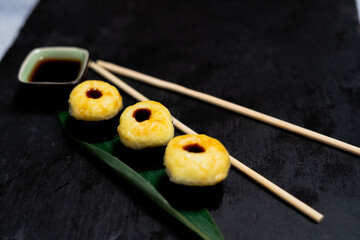 
set of rolls on a black background