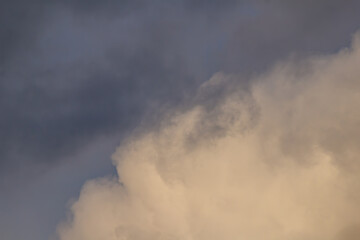 big piece of white cloud on overcast sky