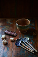 Traditional, handcrafted ceramic. Rustic wooden background. Close up.	