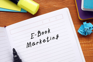 Financial concept meaning E-Book Marketing with sign on the page.