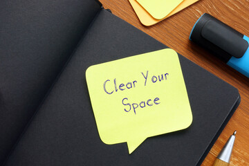 Financial concept about Clear Your Space with phrase on the sheet.