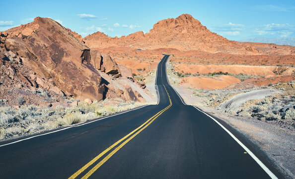 Nevada scenic desert road, color toned picture, USA.