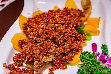 Close up shot of deep fried fish with chili