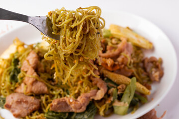 Fried jade noodles with soy sauce and pork