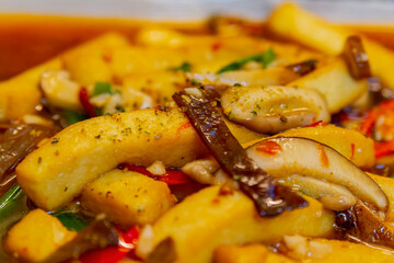Close up shot of fried tofu with mushroom