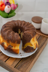 chocolate vanilla sponge cake with peach