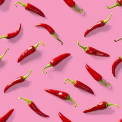 Crédence de cuisine en verre imprimé Piments forts Seamless pattern made of red chili or chilli on pink background. Minimal food pattern. Red hot chilli seamless peppers pattern. Food background.