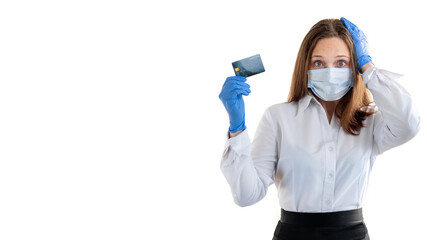 Bank problems. Covid-19 restriction. Blocked account. Worried woman in protective mask gloves holding credit card grabbing head in panic isolated on white copy space. Advertising background