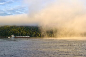 Obraz na płótnie Canvas Foggy morning on the Amur river. Khabarovsk Krai, far East, Russia.