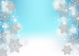 銀色のラメの雪の結晶と綿雪　水色のグラデーション背景　ふわふわの白のドット　冬のフレーム素材