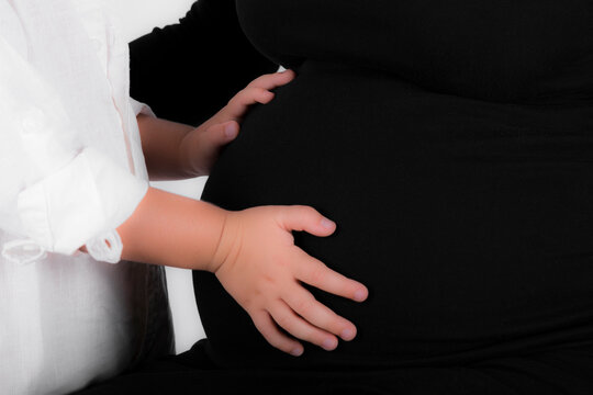 woman holding her belly