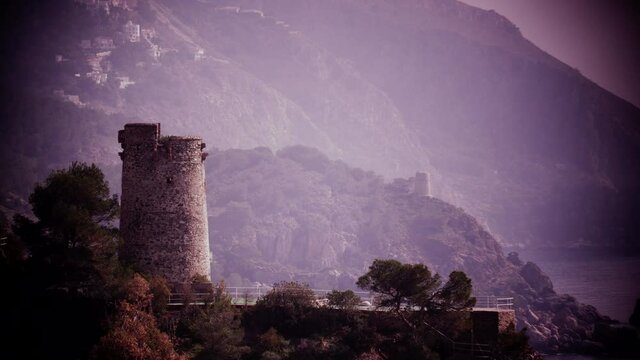 Mediterranean spanish coast landscape. Cliffs of Maro Cerro Gordo Natural Park with Pine tower, near Maro and Nerja, Malaga province, Costa Del Sol, Andalusia.