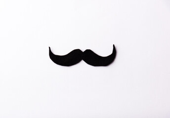 Black mustache, studio shot isolated on white background, Prostate cancer awareness month, Fathers day, minimal November moustache concept