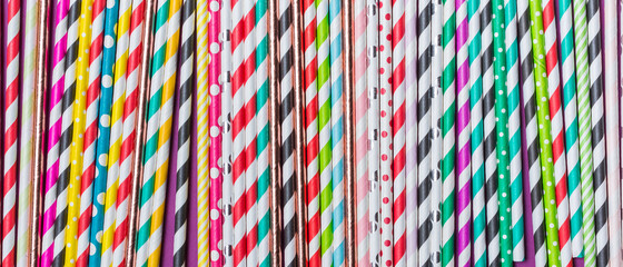 Bright colorful cocktail straws for happy holidays or birthday, surprise party