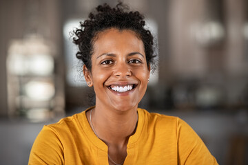 Portrait of happy african woman smiling - Powered by Adobe