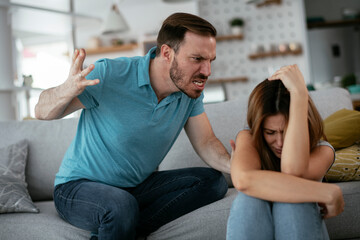 Violence in family. Husband beating his wife.