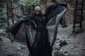 Beautiful young bald woman portrait outdoors. spiritual concept.