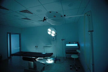 surgery room in the clinic / surgical department with an operating table in a modern medical clinic
