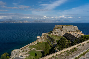 Fototapeta na wymiar Greece Corfu Town city island Old Venetian Fortress view of mountains in Albania Mediterranean ocean