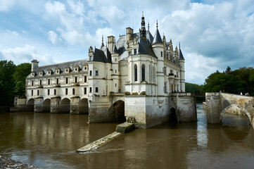 Fototapeta na wymiar ancient castle on the river Loire with reflection in the water
