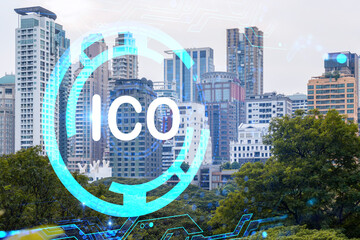 ICO icon hologram over panorama city view of Bangkok, the hub of blockchain projects in Asia. The...