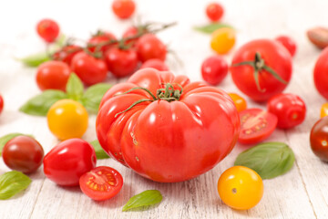 variety of fresh tomatoes and basil