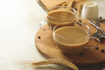 Concept of breakfast with cups of fresh coffee