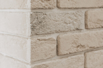 White, beige brick wall close-up. Copy space. Background, texture.
