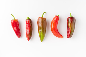 Organic red pepper on white background. Real food concept