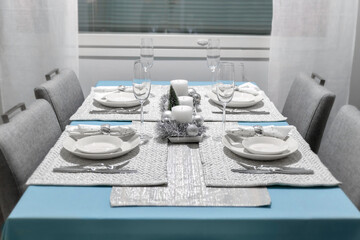 Beautiful table for Christmas. Serving. Christmas candles.