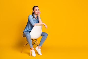 Full size photo of charming attractive girl sit chair enjoy rest relax wear look good outfit footwear isolated over shine color background