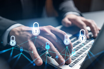 Businessman search for security options, typing laptop background and lock icons hologram.