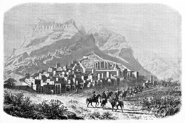 stone town at mountain feet on landscape of Sis (at present days Kozan), Adana province, Turkey. Ancient grey tone etching style art by Grandsire after Langlois, Le Tour du Monde, Paris, 1861